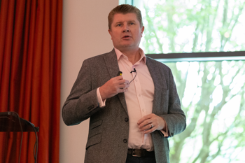 Andy Sparkes talking on stage at Access social care conference 2025