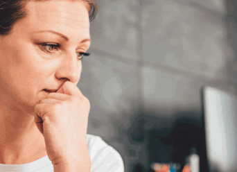 A vulnerable individual looking worried