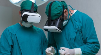 Two surgeons training using VR and AI technology.