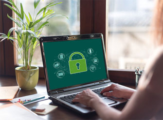 close-up of a laptop with a green lock on its screen