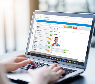 Person using Ezitracker software on laptop