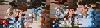 Stock image of employees posing for a photo