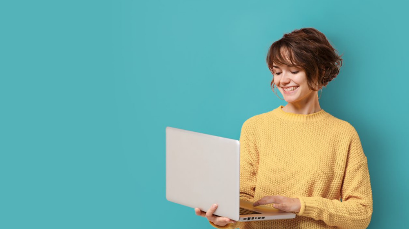 Woman On Laptop In Teal Background 820 X 460 Px
