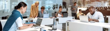 Image of an office with employees