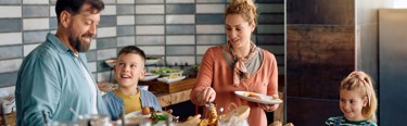 Family At Breakfast Buffet