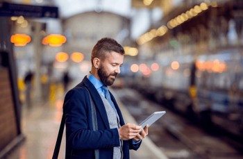 Man using travel expense software