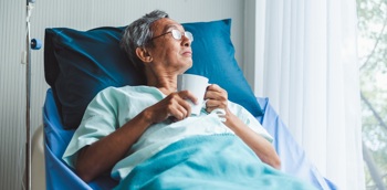 A patient in a hospital bed.