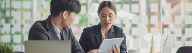 Image of 2 accounting professionals having a meeting