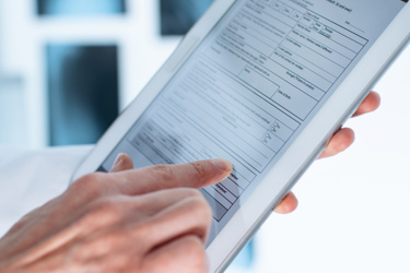 A tablet device featuring healthcare software.